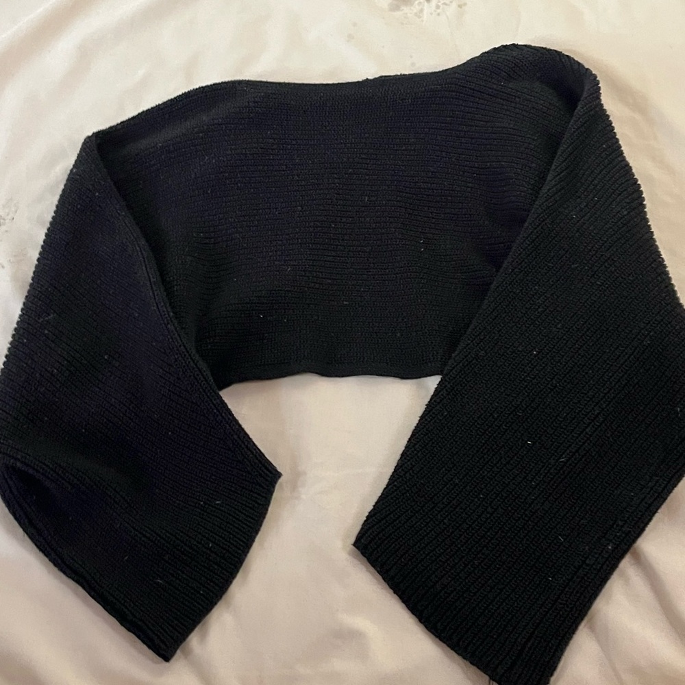 A black off shoulder it also opens on the back